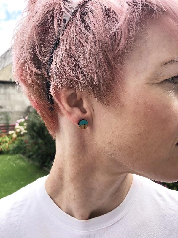 Eco friendly wooden forest stud earrings, shown on model