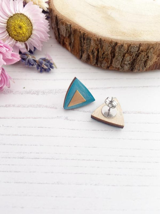 hand painted triangle earrings in metallic blue and green with brass triangles added.