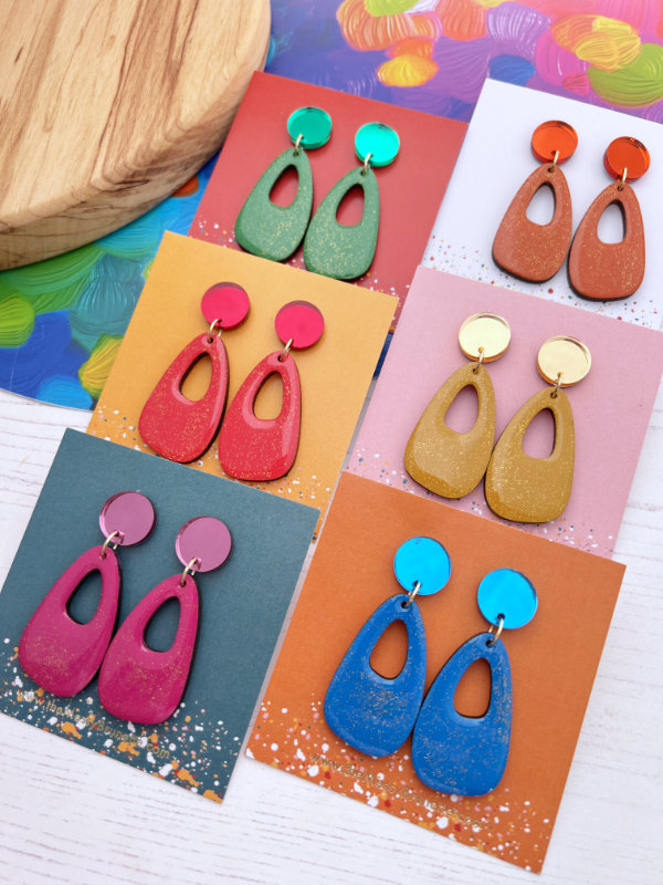 colourful vibrant handpainted wooden earrings in a selection of colours