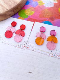 Glitter earrings drops on a branded 'The Messy Brunette' jewellery card