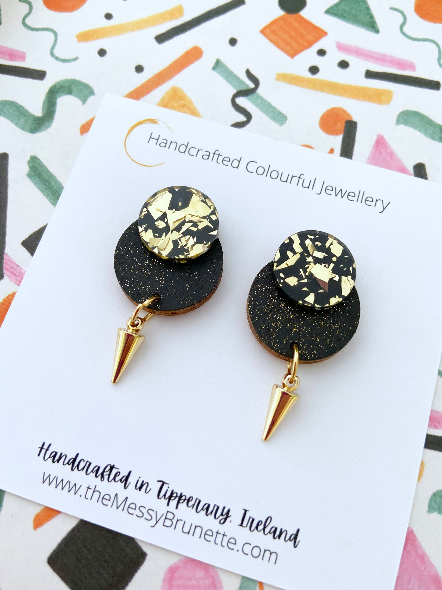 Black and gold glitter wood earrings on a jewellery branded card 'The Messy Brunette'