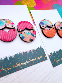 Colourful patterned earrings on a white card with 'the messy Brunette' branding