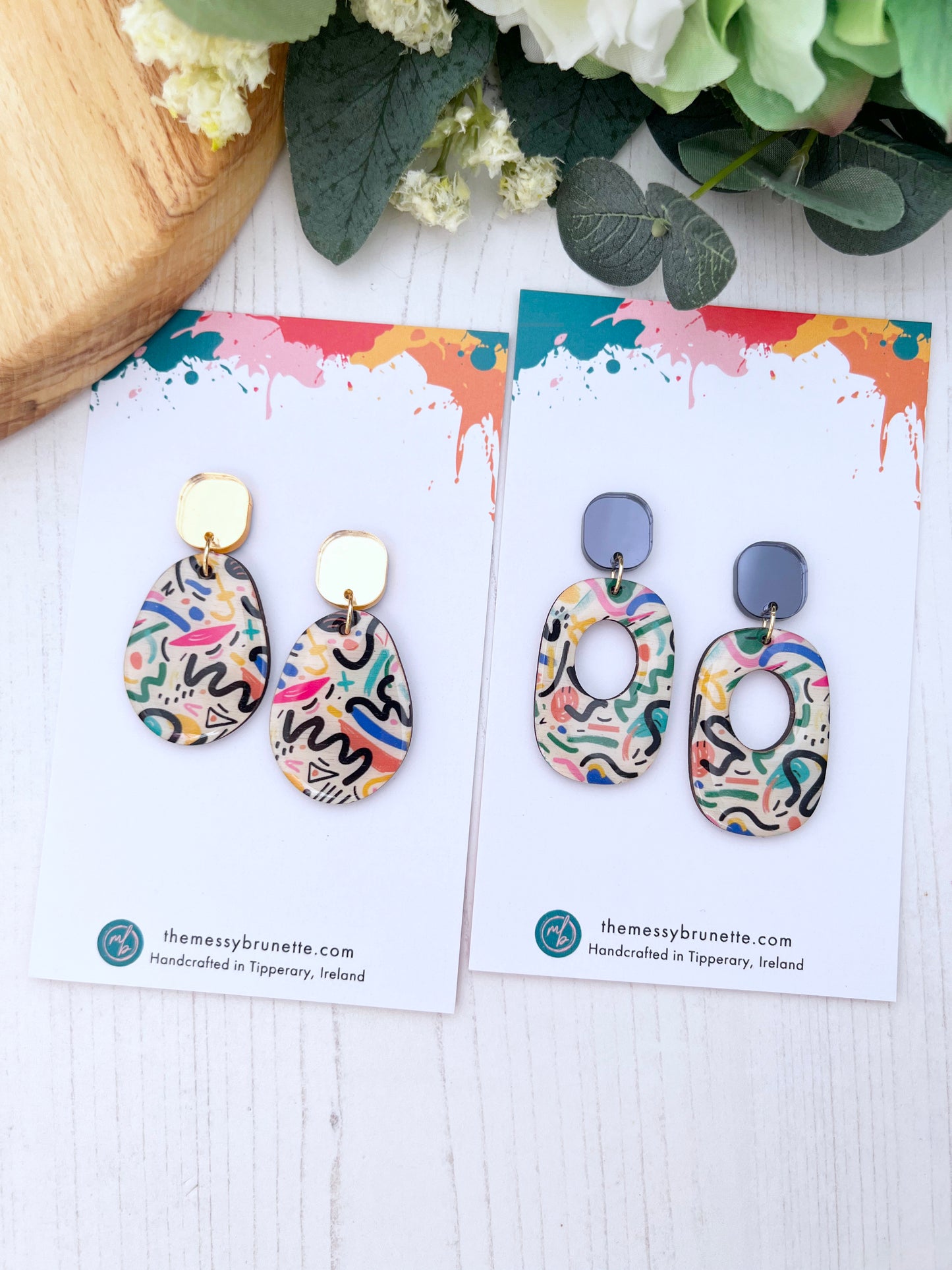 abstract doodle type earrings on a branded The Messy Brunette jewellery card