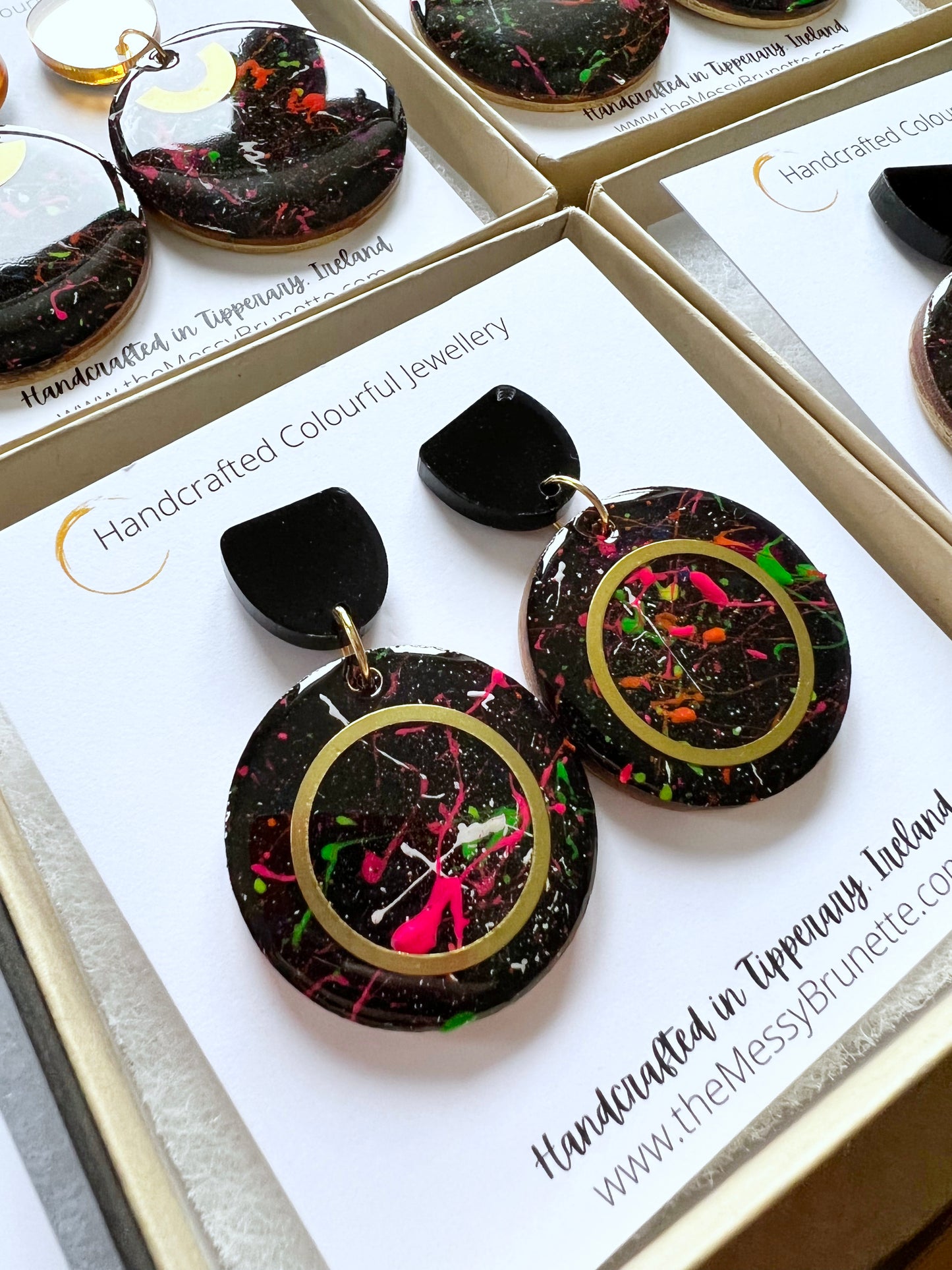 black paint splatter circle wood earrings in a gift box