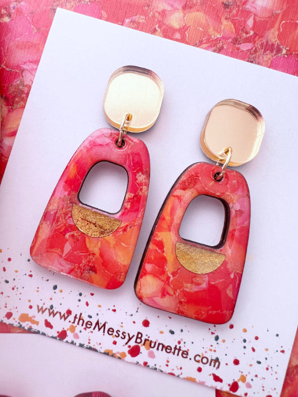 Pink and orange colour clash statement earrings made by the messy brunette jewellery brand
