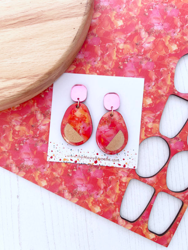 Pink and orange colour clash statement earrings