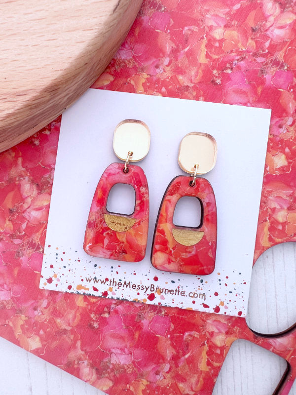 Pink and orange colour clash statement earrings