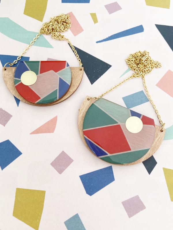 Geometric Wooden Necklace with shades of green, blue, red & pink.