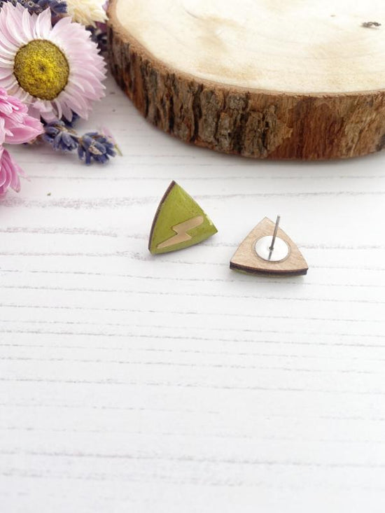 Hand painted olive green triangle studs made from birch plywood.
