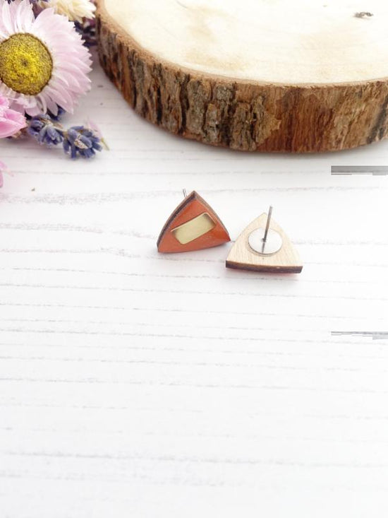 Load image into Gallery viewer, hand painted geometric triangle studs in orange with brass bars added.
